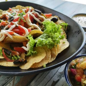 Mouth-watering nachos with fresh salsa, cheese, and delicious toppings. Perfect for appetizers or snacks.